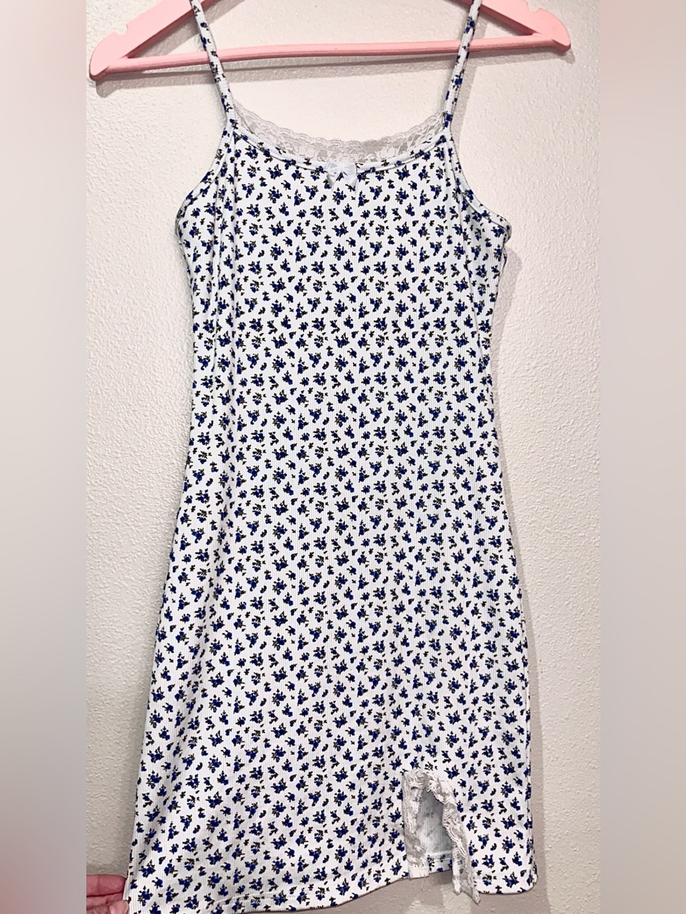 Form-fitting White Mini Dress with Blue Floral Pattern